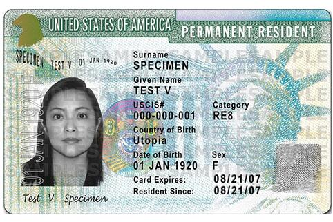 Sample front of previous Permanent Resident Card with signature